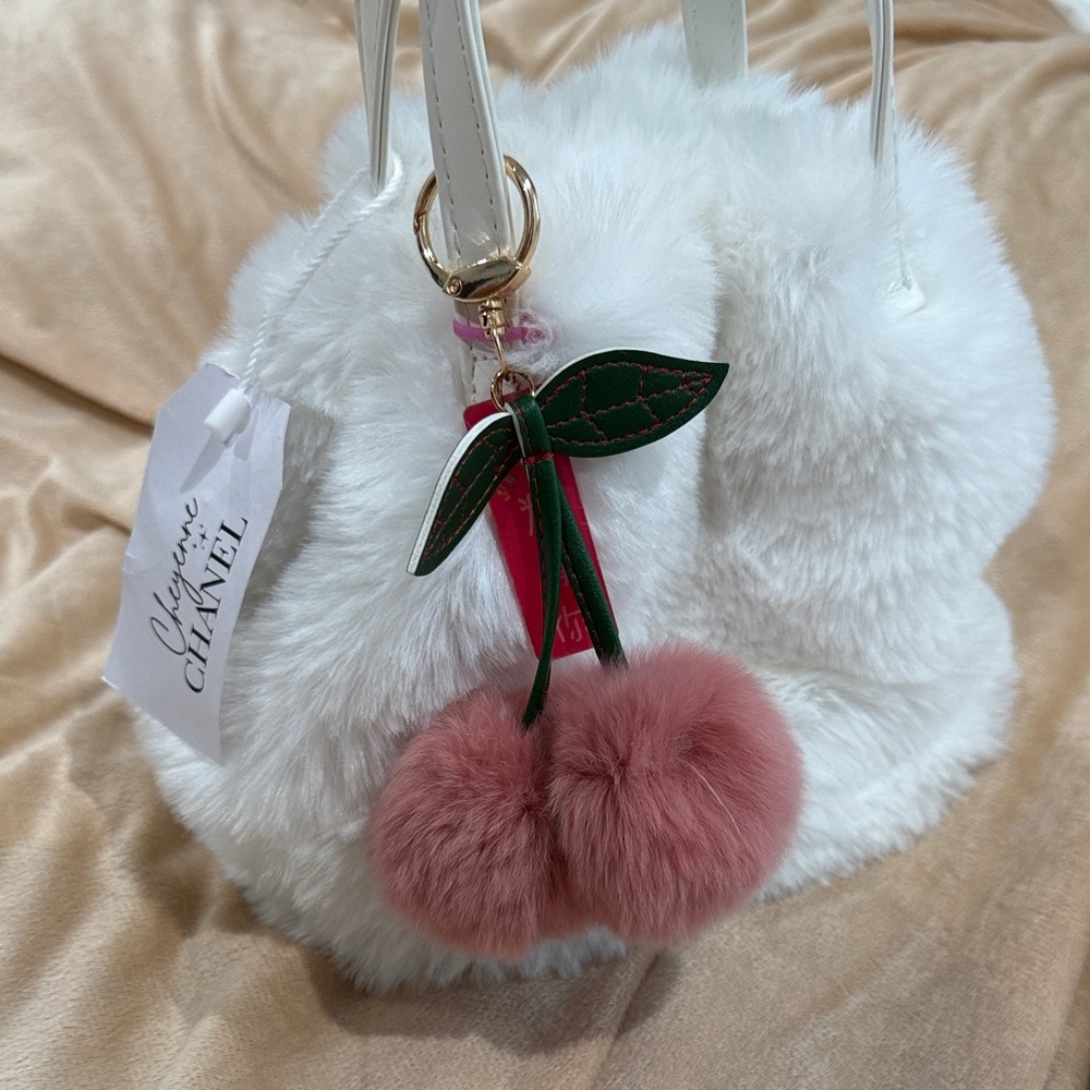 Elegant White Faux Fur Bag with Pink Pom Poms